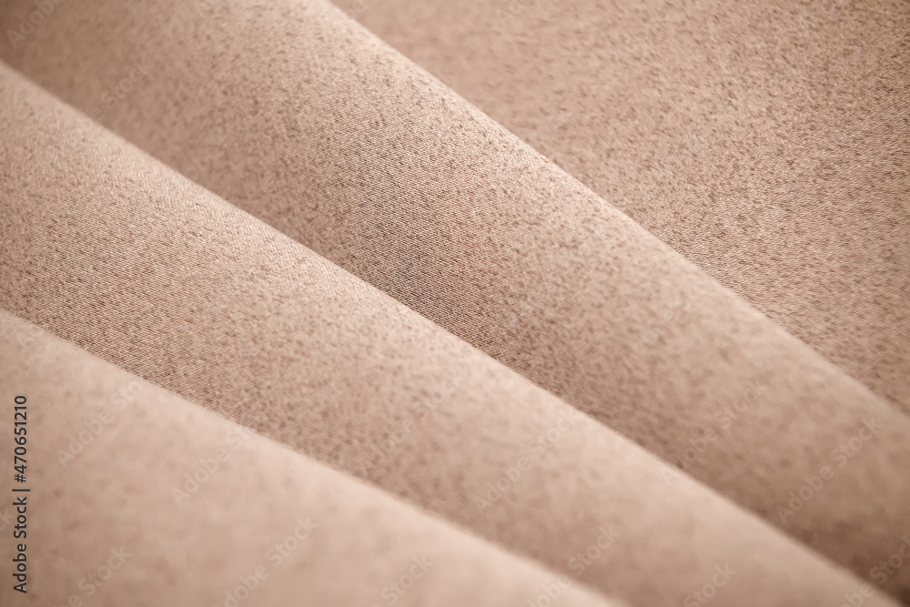 Obraz premium Background, texture. Template. Satin cloth for wedding and evening dresses. A nude shade.
