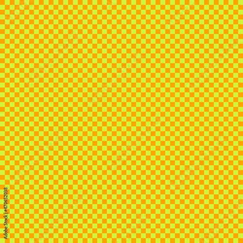 Checkerboard with very small squares. Lime and Orange colors of checkerboard. Chessboard, checkerboard texture. Squares pattern. Background.