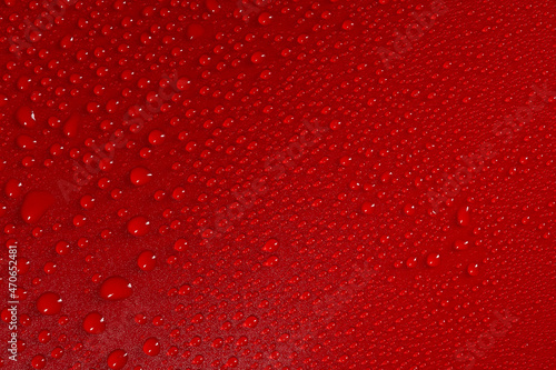 Abstract background, water droplets on red