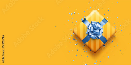 Yellow gift box with blue bow.