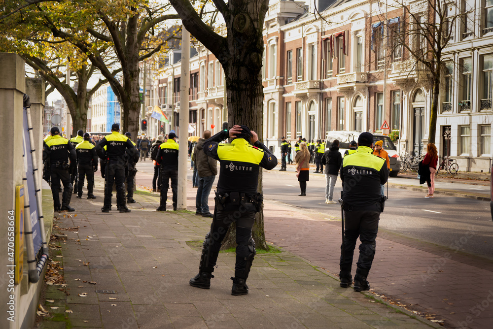 07 November 2021, Hague, Netherlands, Malieveld, Protest against measures for preventing COVID-19 infections, police forces on duty, providing order and protecting people lives  and property