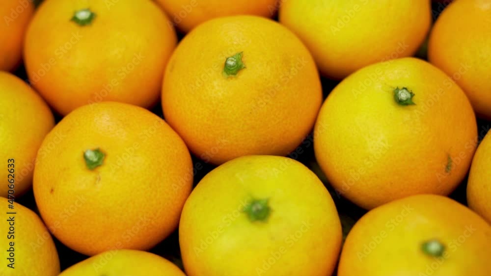 Tangerines, Citrus Fruits, Macro, Close-up. Orange Ripe Tangerines, Rotation, Isolated. Healthy Vitamin Food and a Vegetarian Diet. Harvest, Tangerines on the Counter, Market.