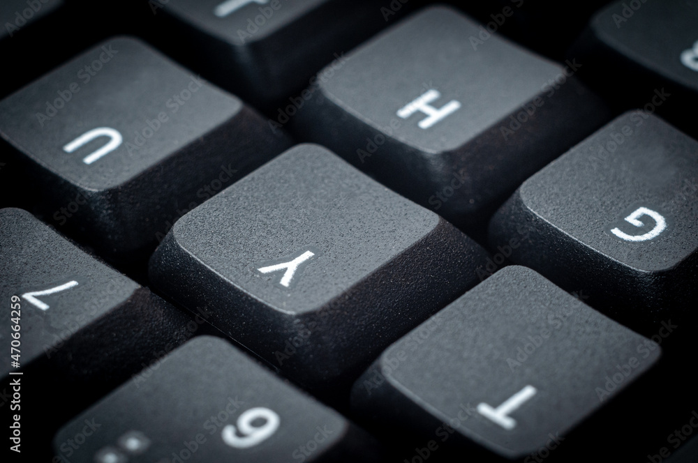 Black keys from a laptop with symbols close-up. Black keys from a laptop with symbols close-up.