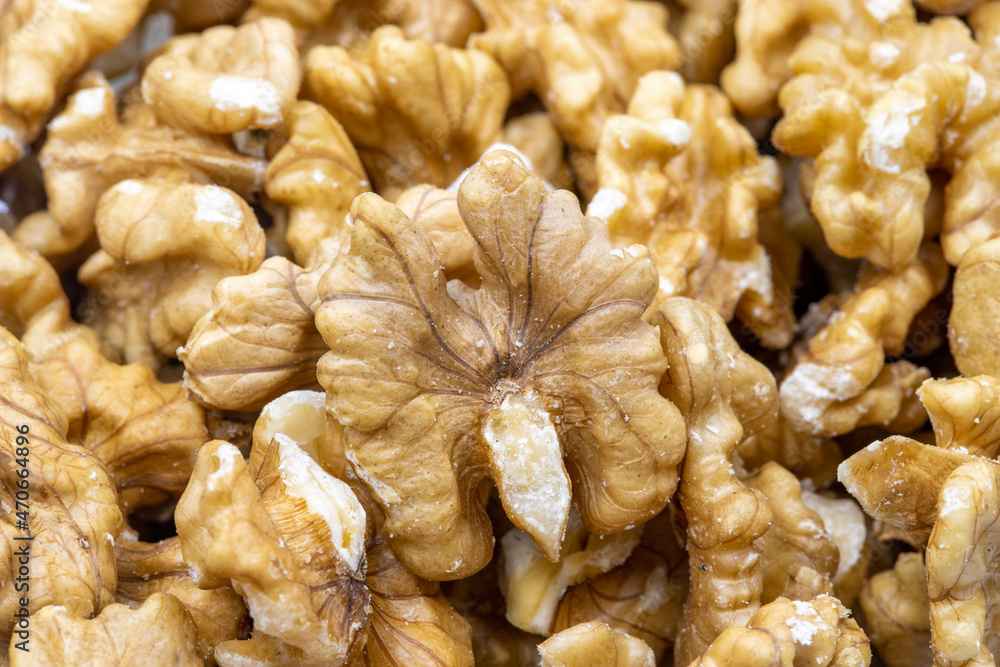 Close-up of peeled walnuts. food background. Snack Fresh Nuts. Close-up of peeled walnuts. food background. Snack Fresh Nuts.