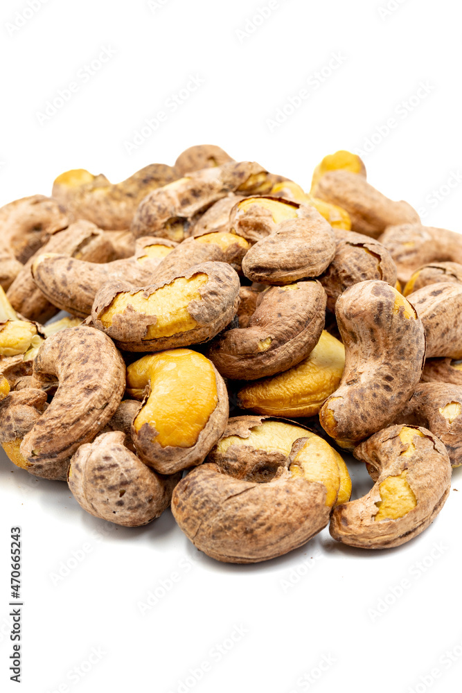 Shelled cashews isolated on white background. Snack fresh nuts. close up. Story format Shelled cashews isolated on white background. Snack fresh nuts. close up. Story format