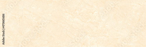 Marble texture, yellowish beige stone background Crema Marfil photo