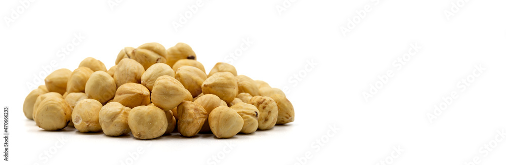 Fototapeta premium Hazelnut kernel isolated on white background. Snack fresh Peeled hazelnuts. close up. Empty space for text. Copy space