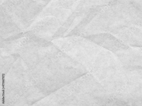 White crumpled greaseproof paper texture background. photo