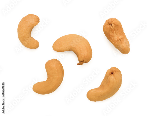 Roasted cashew nuts isolated on white background. Top view.