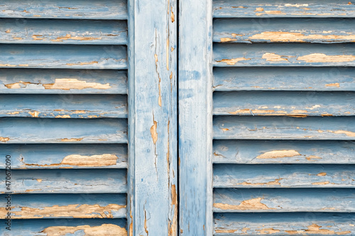 Close up of old blue windows shutters