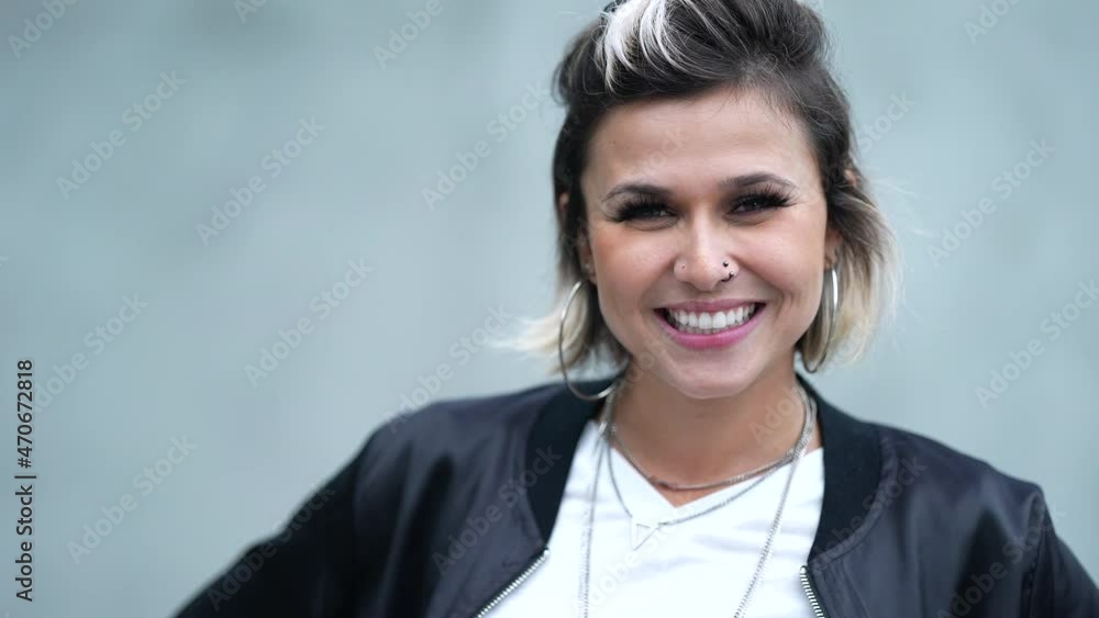 Young woman portrait face smiling at camera Young woman portrait face smiling at camera