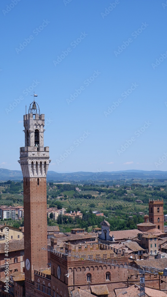 Bell tower of the Palazzo Pubblico, at the Piazzo del Campo, Siena, Italy. 