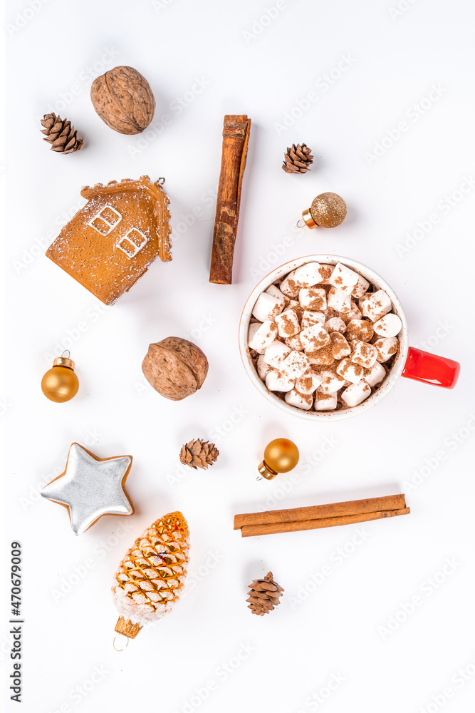 Christmas composition of toys, cones and cocoa mugs with marshmallows on a white background. Flat lay, top view Christmas composition of toys, cones and cocoa mugs with marshmallows on a white background. Flat lay, top view