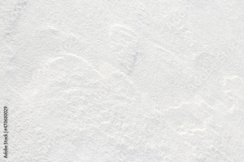 Snow texture, white snow surface after blizzard and strong wind