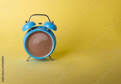 Alarm clock and coffee concept illustration isolated on yellow background. Morning with coffee and coffee time concept