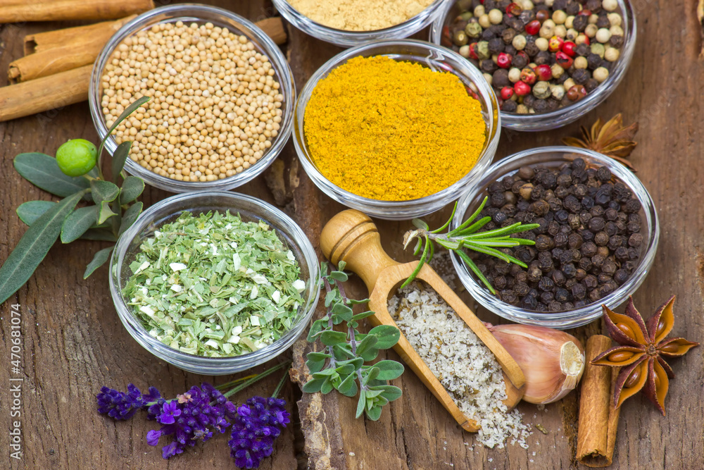 Variety of spices on wooden background Variety of spices on wooden background