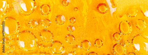 strong extract of gold cannabis wax with high thc close up