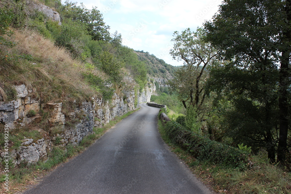Landscape of road and cliff in the valley of the Dordogne, france