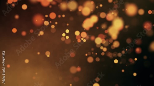 Abstract looping motion background with flying particles. Animated overlay with bokeh golden lights, seamless loop.