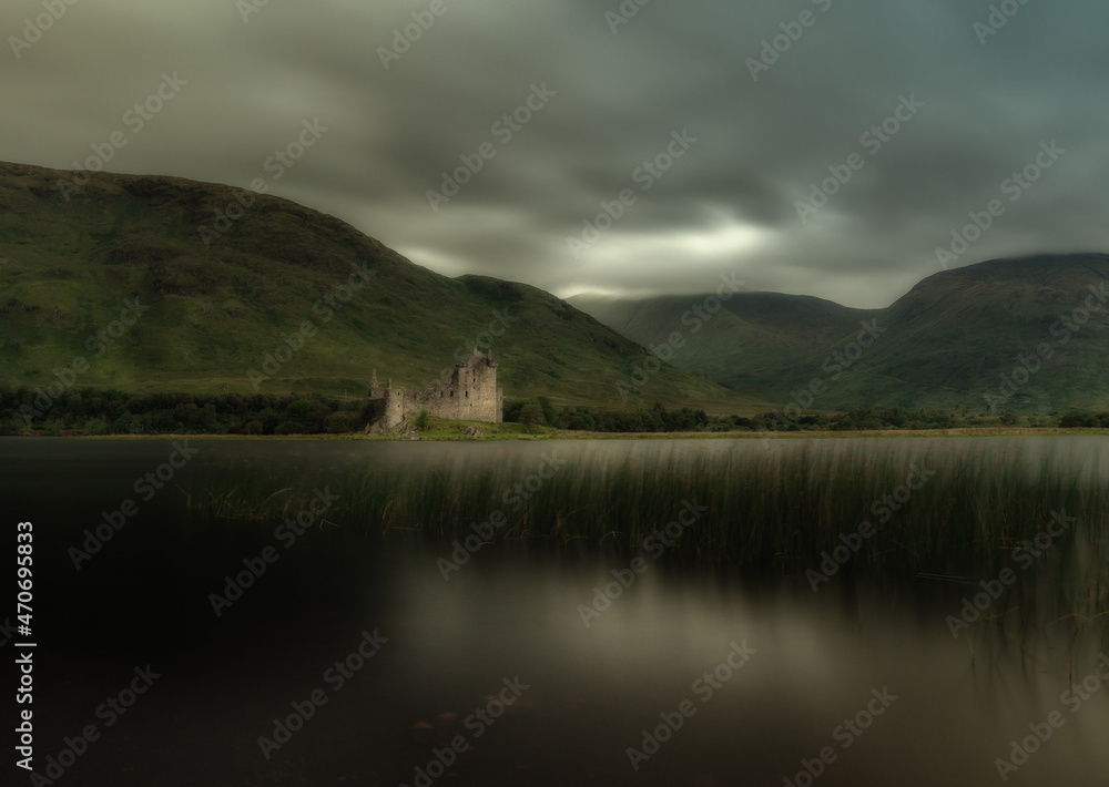 Old scottish castle nearby a lake