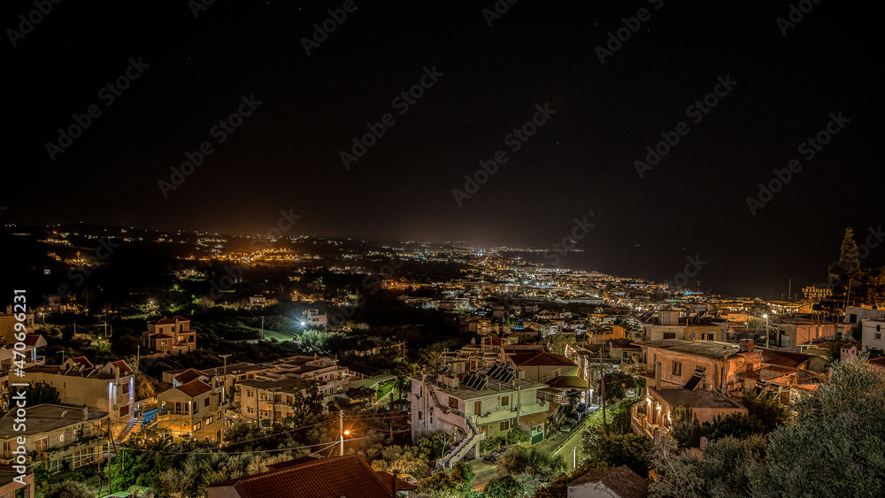 overlooking Platanias at night from an high viewpoint