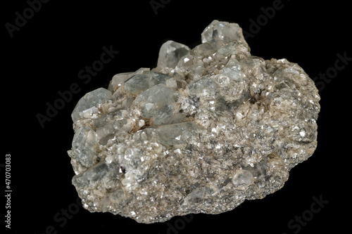 Macro stone aquamarine mineral on a black background