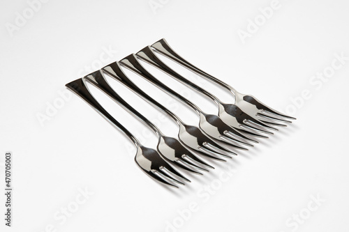 Steel forks isolated on white background. High-resolution photo.Mockup