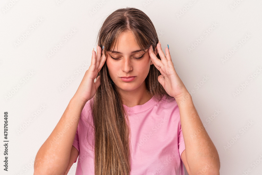 Young caucasian woman isolated on white background touching temples and having headache. Young caucasian woman isolated on white background touching temples and having headache.