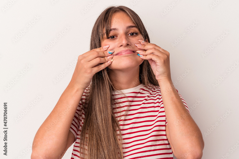 Young caucasian woman isolated on white background doubting between two options. Young caucasian woman isolated on white background doubting between two options.