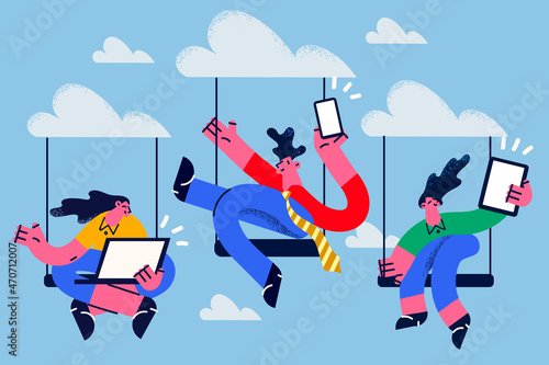 Diverse employees work on gadgets with cloud computing 