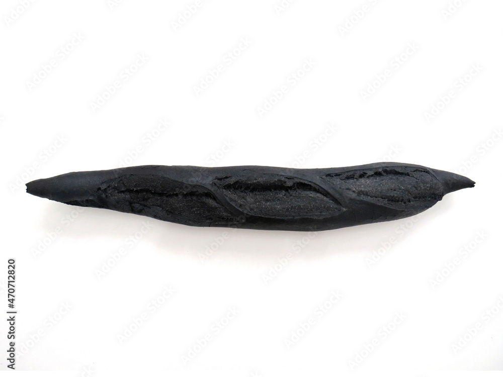 Isolated black bread. Close up of loaf of rye sourdough bread. German bread, black loaf on white background. Organic food and Organic nutrition. Isolated black bread. Close up of loaf of rye sourdough bread. German bread, black loaf on white background. Organic food and Organic nutrition.