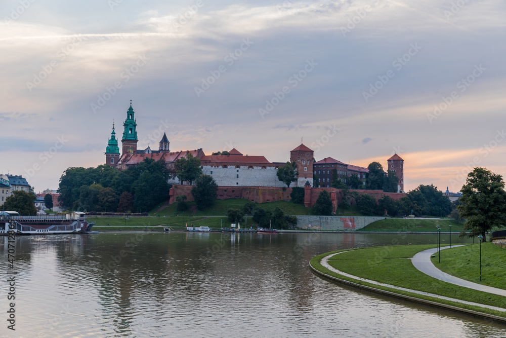 Wawel hill with historical royal castle building in Krakow, morning.