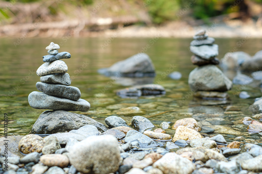 A pile of pebbles by a river on Middle Fork Trail, North Bend, WA, USA A pile of pebbles by a river on Middle Fork Trail, North Bend, WA, USA