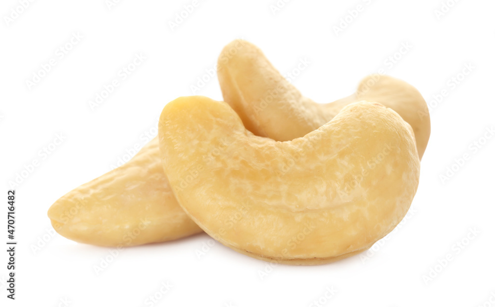 Pile of tasty organic cashew nuts isolated on white Pile of tasty organic cashew nuts isolated on white