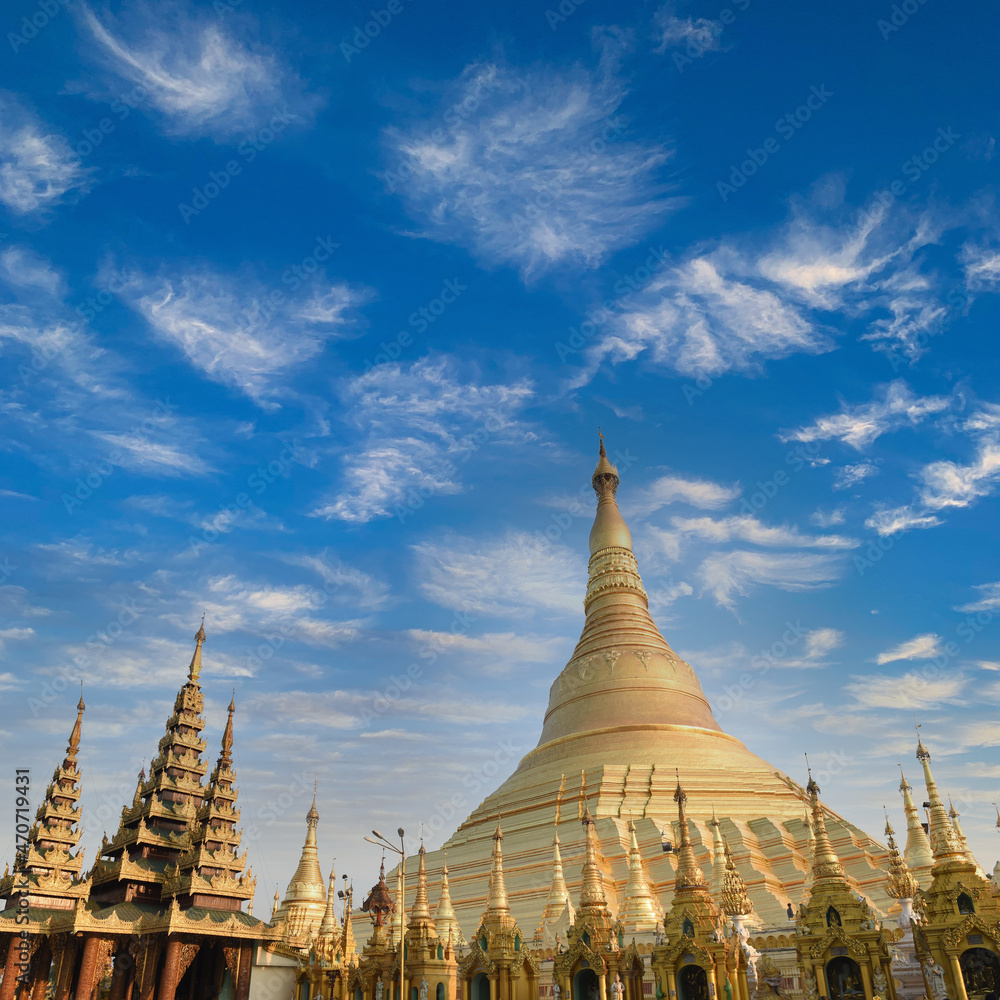 Fototapeta premium panorama view to the most famous and biggest Shwedagon pagoda with group of golden stupes beside in Yangon, Myanmar (Burma)