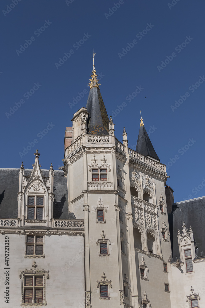 Obraz premium Architectural detail of Castle of Dukes of Brittany (Chateau des ducs de Bretagne). Castle was residence of Dukes of Brittany between XIII and XIV centuries. Nantes, Loire-Atlantique, France.
