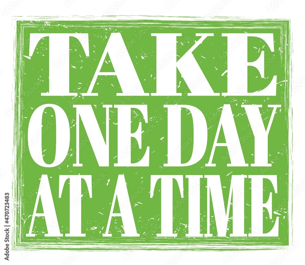 TAKE ONE DAY AT A TIME, text on green stamp sign