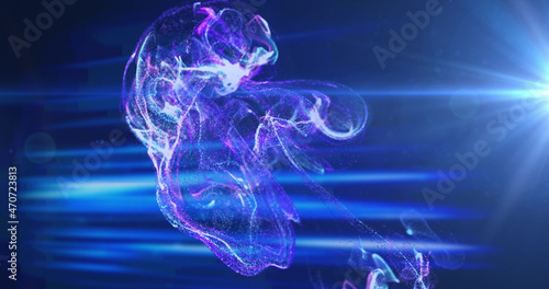 Image of glowing blue and pink particle forms and blue lights moving on black background photo