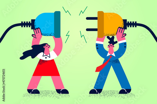 Businesspeople connect plugs for shared business goal 