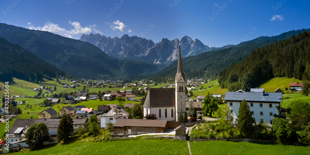 Church on top of hill near beautiful mountains view Church on top of hill near beautiful mountains view