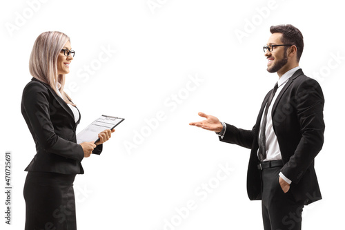 Businessman talking to a businesswoman photo