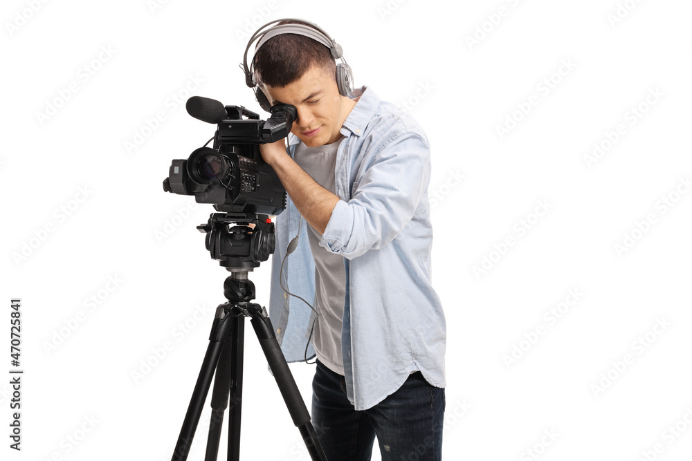 Cameraman recording with a camera on a stand