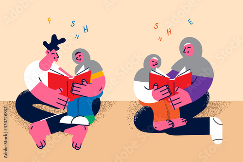Happy muslim family with children read books
