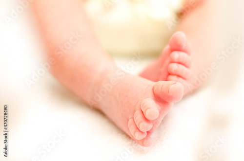 Newborn small foot, white and black.