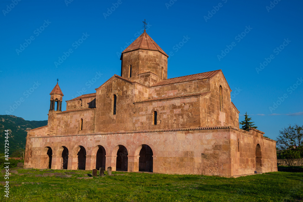 Medieval Odzun Church (5th-7th century) at sunset time, Armenia