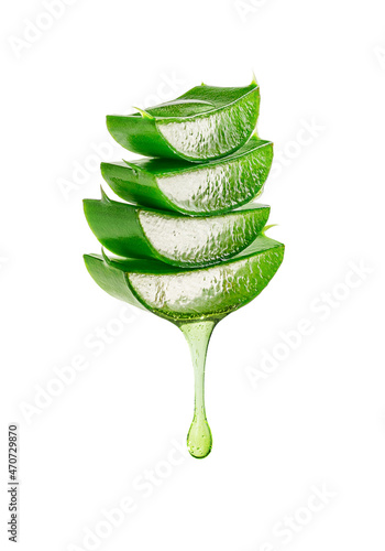 Aloe vera gel dripping from sliced pieces. Isolated on white background photo