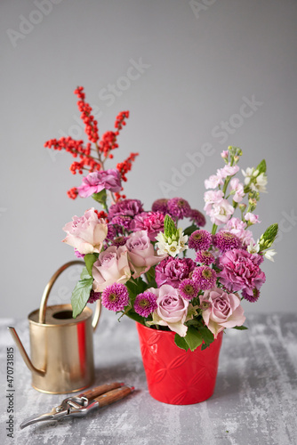 Finished flower arrangement in a vase for home. Flowers bunch  set for interior. Fresh cut flowers for decoration home. European floral shop. Delivery fresh cut flower.