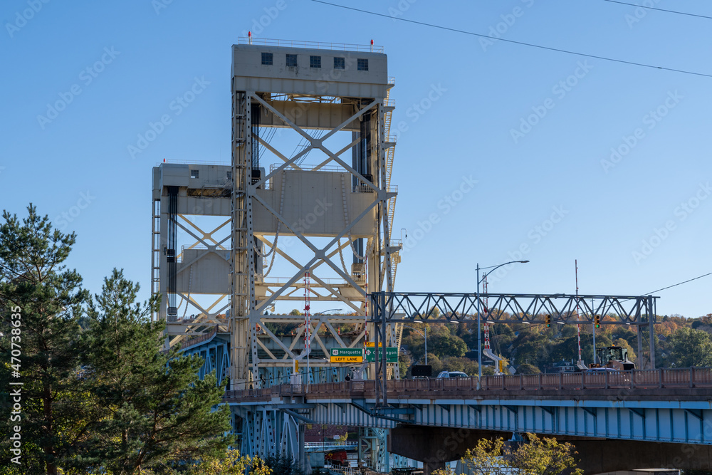 The famous Houghton aerial lift bridge - also known as the Portage Canal Lift Bridge, connects the cities of Hancock and Houghton Michigan