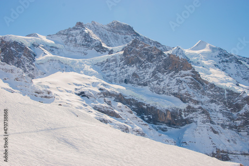 Beautiful panoramic view of snow-capped mountains in the Swiss Alps.. © Racoonbtc