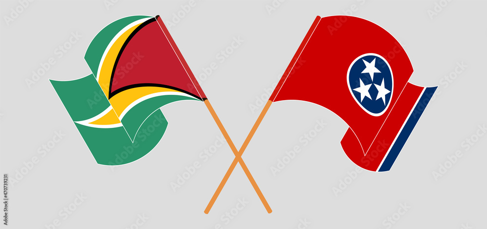 Crossed and waving flags of Guyana and The State of Tennessee Crossed and waving flags of Guyana and The State of Tennessee